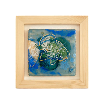 Painting of a line art goldfish on a background of lily pads and blue abstract markings. Piece is in a thin wooden frame.