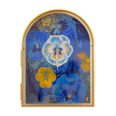 Painting of several blue and yellow and white pansy flowers of varying transparency, layered together like a collage. A thin woman stands in the center and looks off to the distance.