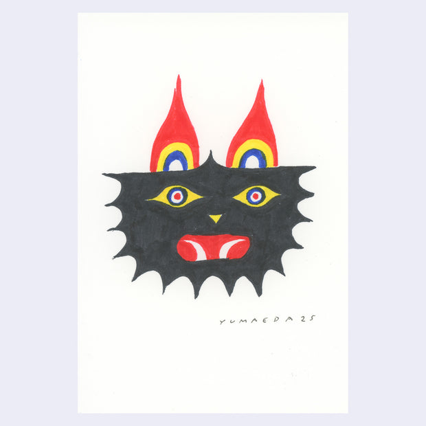 Marker illustration on white paper of a black cat like animal creature with yellow eyes and blue, red and white concentric circle eyes. It has an open mouth with 2 curved fangs. It has red ears that are pointed.