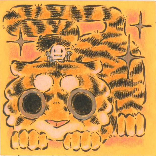 Drawing of a cute cartoon tiger on an orange post it.