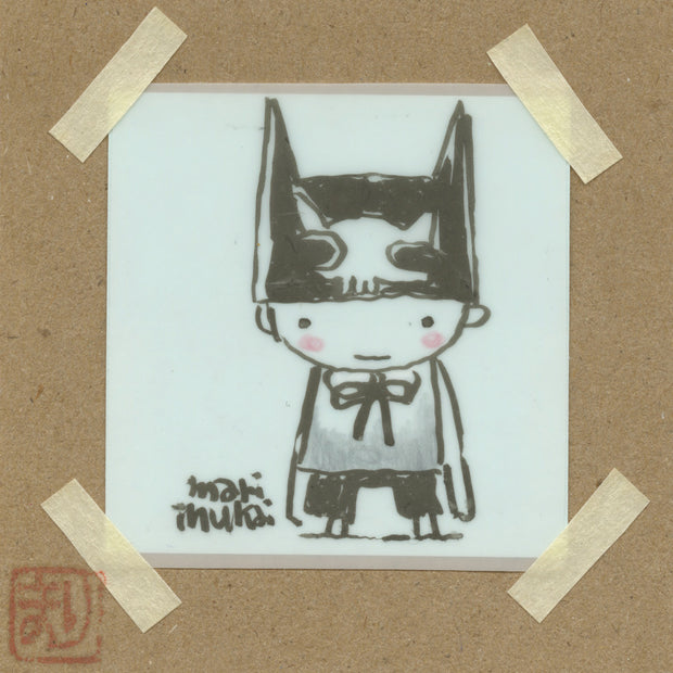 Marker illustration of a small character with a simple, smiling face wearing a black cap with 2 pointed cat like ears. Piece is taped to cardboard backing.