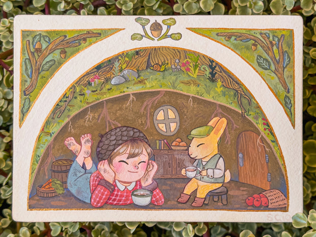 Colored pencil illustration of a child and a rabbit sitting in an underground burrowed home, furnished with some wooden furniture and food. They both smile and share a cup of tea. Above ground is much greenery with a large tree and mushrooms.