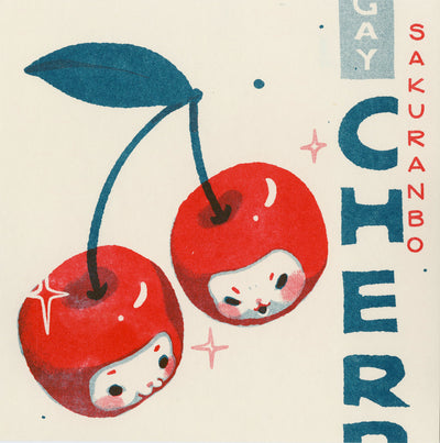 Risograph print, red and teal ink on cream paper of a pair of cherries with cute, cat faces. Writing runs down the right side of the piece.