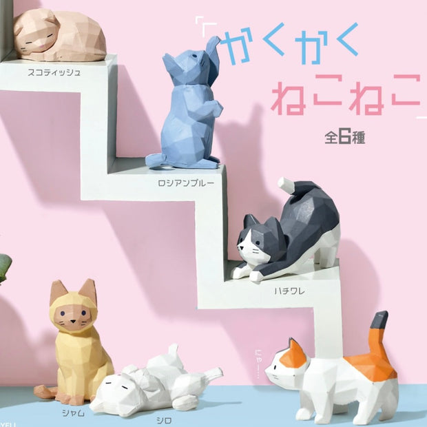 Graphic displaying 6 different figures of cats made to look like they are carved out of wood and then painted. They are in various poses and of different colorings.