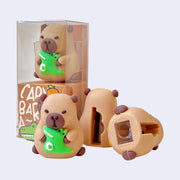 4 rubber bodied pencil sharpeners, shaped like capybaras holding small animals.