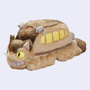 Fluffy large plush of Catbus, laying on its stomach with attached elements such as mice as tail lights and 3D eyes, nose, whiskers.