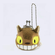 Small plush clasp closure coin purse of Catbus's head, with a large smiling grin and yellow eyes. It has a chain attachment. 