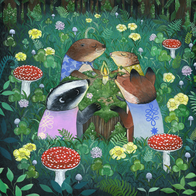 Painting of 4 cartoon woodland animals: badger, fox, beaver and mouse, wearing capes and holding hands in a circle over a mossy stump with a lit candle on it. Around them is lush foliage and red mushrooms.