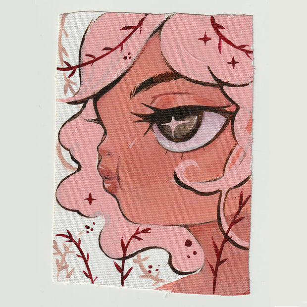 Painting on cut canvas paper of a girl, seen close up and seen from the side, with her mouth formed like she is about to blow a bubble with gum. Her hair is pink and flowers are around her.