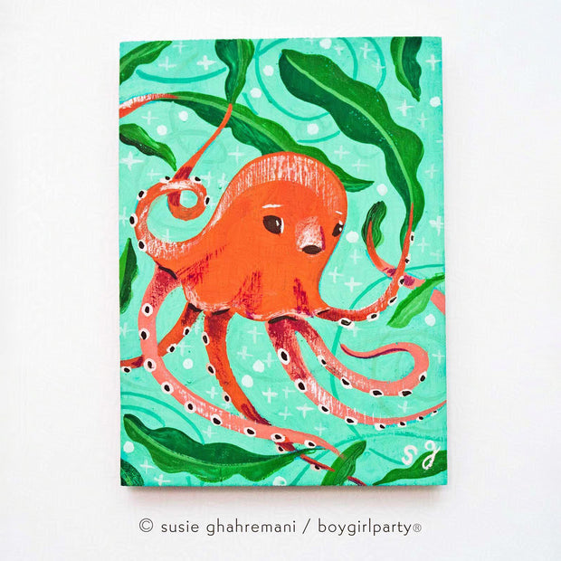 Painting of a red squid swimming amongst a lot of seaweed and kelp.