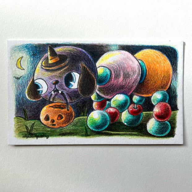 Colored pencil illustration of a figure made out of balls, akin to a caterpillar with bals for legs as well. Its head is of a dog with floppy ears and large blue eyes. It wears a small witch's hat and holds a pumpkin shaped basket in its mouth. 