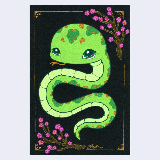 Illustration of a green snake with a large head and sparkly eyes. It has dark green and gold spots and a forked tongue. It looks up cutely and is on black background with gold bordering and pink cherry blossom branches.