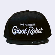 Flat billed cap, black with white stylized letters that say "Los Angeles Giant Robot" across the front.