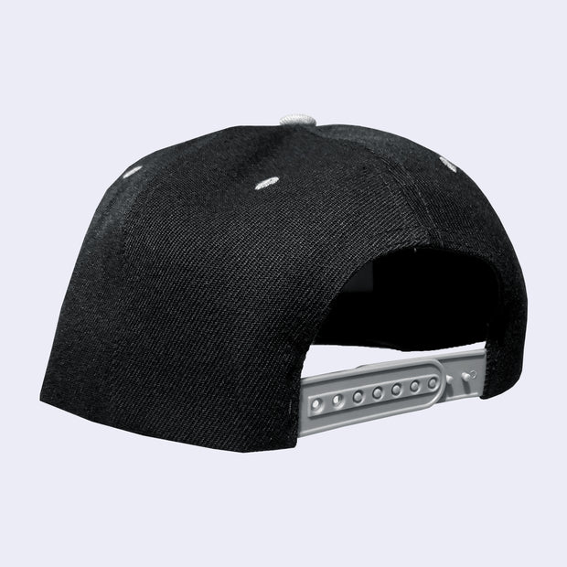 Back view of black cap with gray adjustable snap closure.