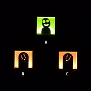 3 small wooden boxes with light fixtures in the back illuminating the cut out character in the center. One is a Kodama, two are No Face.