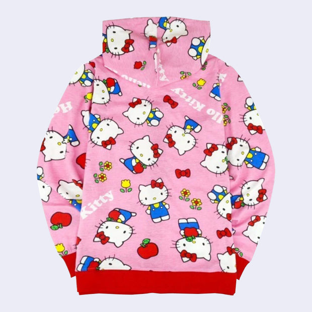 Pink hooded zip up jacket with a repeating all over pattern of Hello Kitty, standing and sitting with flowers and apples. "Hello Kitty" is written in white font throughout the pattern.