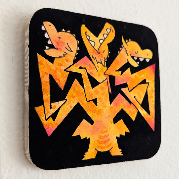 Painting of an orange King Ghidorah, a dinosaur kaiju mosnter with 3 heads and wings. Its heads are attached to its body by zig zagging necks. Each head has a happy, carefree expression.