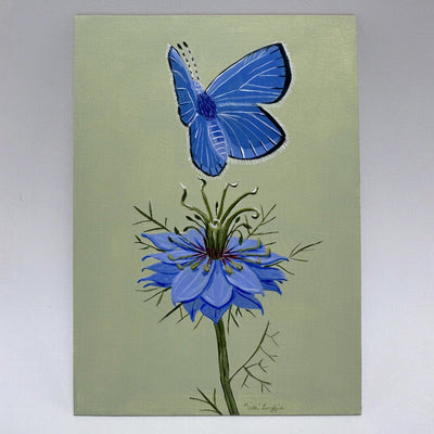 Painting of a blue butterfly flying over a single blue flower with many thistles coming out from the stem and around the blossom. Background is a sage green.