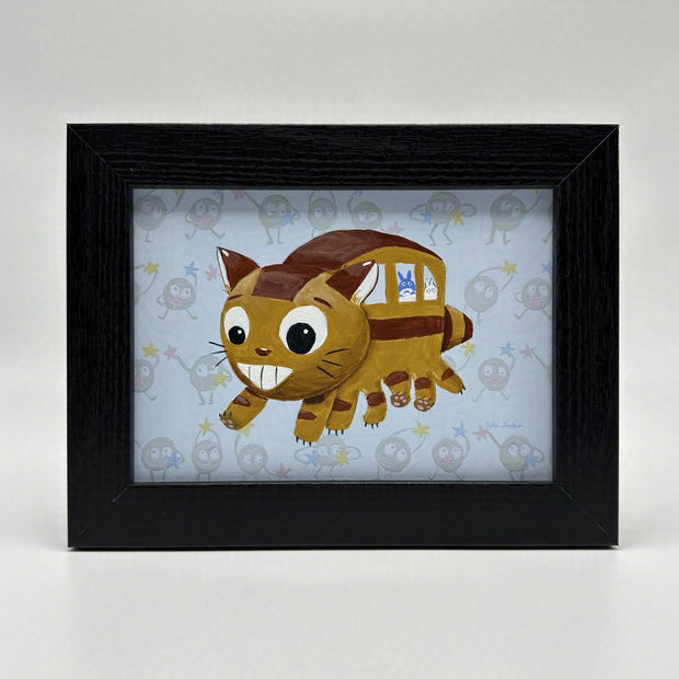 Painting on light blue background of a stylized Catbus from My Neighbor Totoro, it has large cartoon eyes and one is bigger than the other. Small Totoro characters sit in the passenger seat.