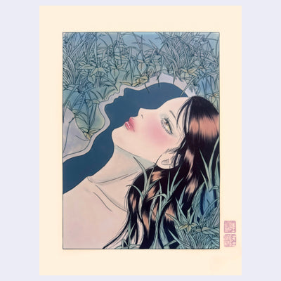 Illustration on cream paper of a woman's face, leaning back with her long black and brown hair falling to her side. Her face is cut cleanly down the middle, producing a blue silhouette. Grass and leaves surround her.