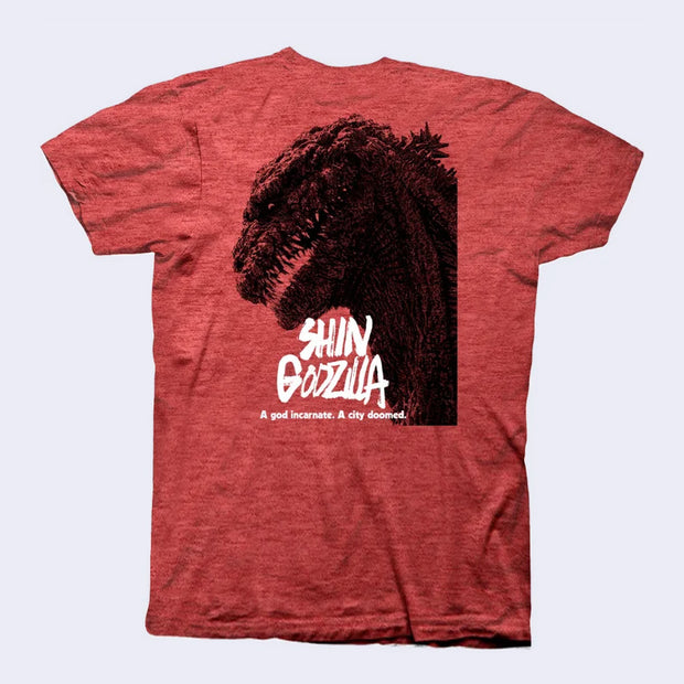 Heather red t-shirt with a graphic of Godzilla's head in profile view with white font that reads "Shin Godzilla"