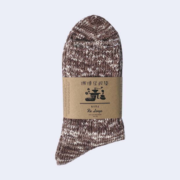 Cotton crew socks thickly knit with a dark but warm brown and white thread. Each color is mixed.