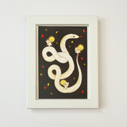 Colored pencil illustration of a white snake with its body twisted around itself. Small white bunny characters stand on different parts of the snake and hold up glowing sparklers. Background is black with red and yellow confetti. Piece is framed.