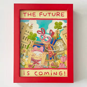 Painting of 2 cartoon style women standing in a field of flowers. One kneels and has her hands shaped to form a "c" over her face, the other stands and holds 2 four leaf clovers. Text around reads "The Future is Coming!" Piece is in thick red frame.