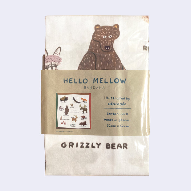Folded bandana in its product packaging, with an illustration of a grizzly bear and a raccoon. 