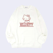 White sweatshirt with a red ink line art graphic of Hello Kitty, sitting and holding an apple in her hand. Below her is fully capitalized text that reads "Hello Kitty".