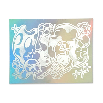 White ink on holographic sticker of a small skeleton character creating a large cat shaped bubble with a bubble wand.