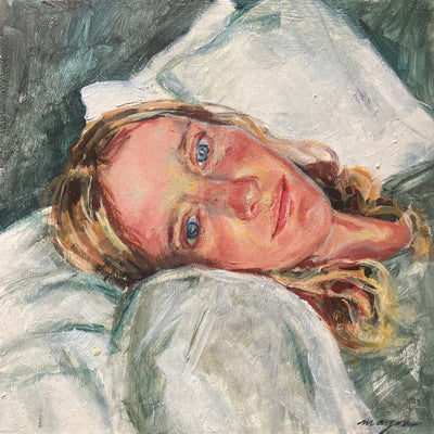 Painting of a blonde woman laying in in a bed with white sheets and fluffy pillows. She looks directly at the viewer with bright blue eyes.