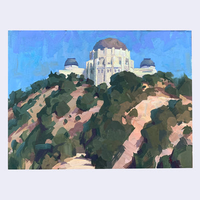 Plein air painting of the Griffith Observatory, up high on a hillside with many green bushes and trees.