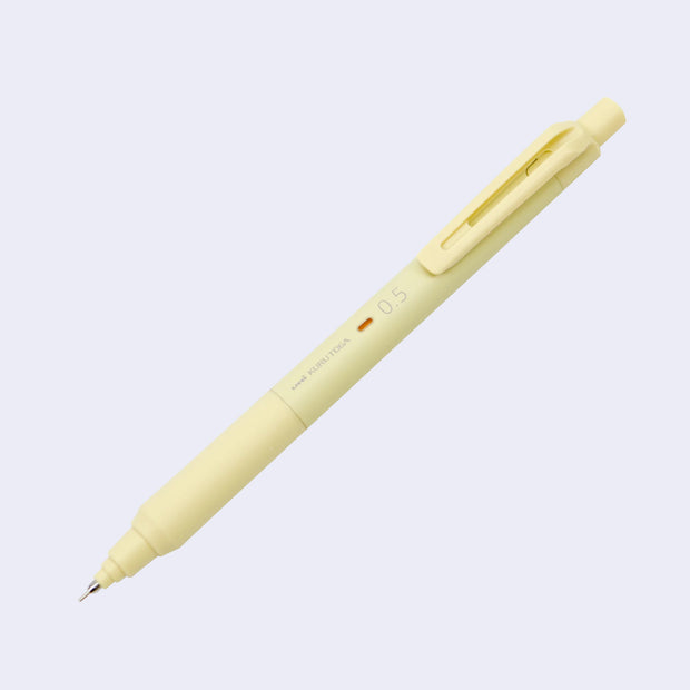 Cream yellow bodied mechanical pencil, with a matching color cap over the eraser and a clip for attaching to a pocket or piece of paper.