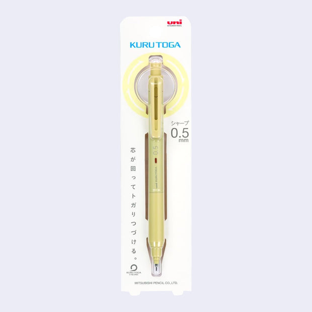 Kuru Toga mechanical pencil encased in its product packaging, with Japanese writing along it describing its functions.