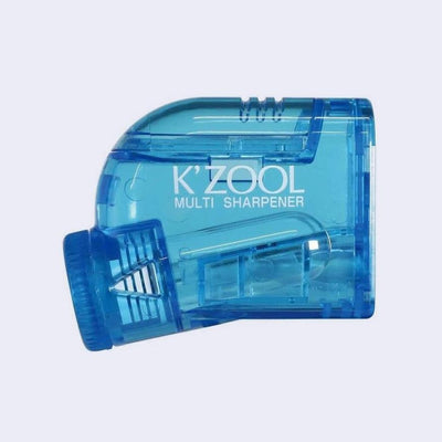 K'Zool pencil sharpener, clear blue with a dial to adjust to 5 different settings of varying sharpness.