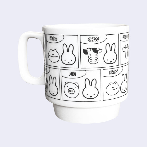 White ceramic mug featuring black line illustrations of Miffy and various animals, partnered together with text labeling each animal. It has a tapered in bottom, allowing it to be stacked with more mugs.