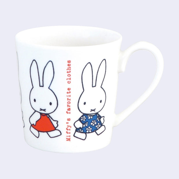 White ceramic mug with illustrations of Miffy, dressed in 2 different outfits and walking to the right. Red typewriter style text reads "Miffy's favorite clothes"