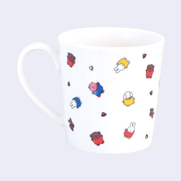 White ceramic mug with many small Miffy and Friends characters, all standing with their arms either extended out or up.