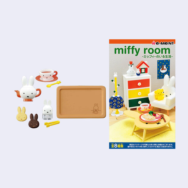 Blind box series of miniature room items themed around Miffy. Example shows Miffy shaped cookies, mini tongs, a mini spoon, and miniature Miffy shaped tea kettle and tea cup, along with a serving tray to place them all onto.