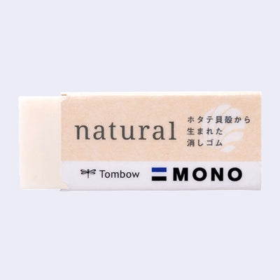 Cream colored rectangular eraser with a paper sleeve that reads "natural" alongside text in Japanese.