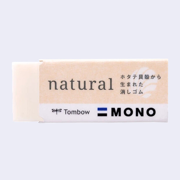 Cream colored rectangular eraser with a paper sleeve that reads "natural" alongside text in Japanese.