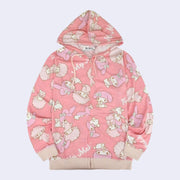 Pink hooded zip up jacket with an all over pattern of My Melody and My Sweet Piano, sitting next to one another with "My Melody" written in white cursive throughout the pattern.