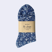 Cotton crew socks thickly knit with navy blue and white thread. Each color is mixed.