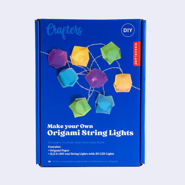 Product packaging for Make Your Own Origami String Lights, with a the final product on the front, 8 colorful boxes made out of paper with string lights attached.