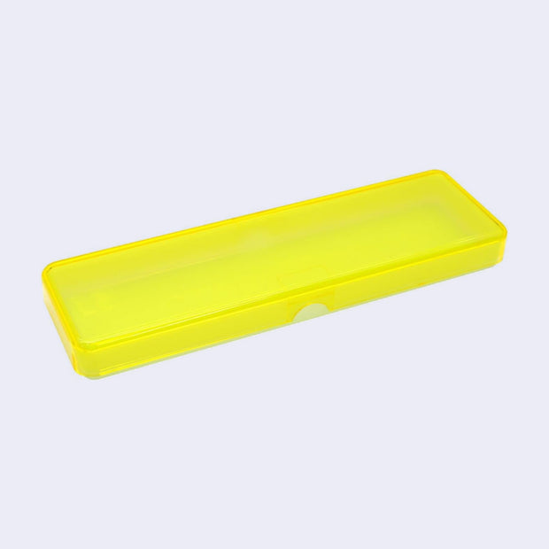 Yellow translucent pencil case with a mint green colored bottom, closed so a slightly greenish yellow color is created.