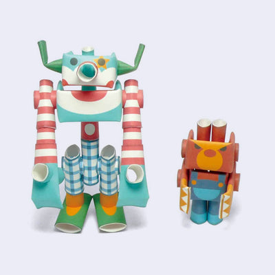 Pair of 2 robots made out of paper pipes, bent to built the robots. One is tall and resembles a clown and the other is short and resembles an angry bear.