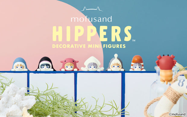 7 options for Mofusand Hipper figures - cute cartoon cats wearing costumed inspired by sea creatures such as sharks, fish and squids.