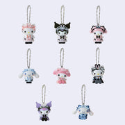 8 different mini Sanrio figures attached to ball chains, all dressed in a gothic Lolita style dress with dreamy eyes and blushed cheeks. Characters are: Hello Kitty, Kuromi, My Melody, and Cinnamoroll.