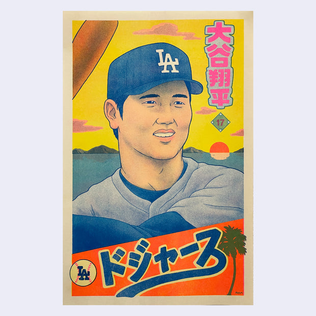 Bright colored risograph print of Shohei Ohtani from the Dodgers, close up showing his face with a slight smile and holding up a bat. Japanese text is in the upper corner and bottom section. Background is a bright yellow sky with the sea.